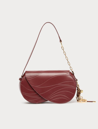 Charm-adorned wavy flapover bag - BRICK RED